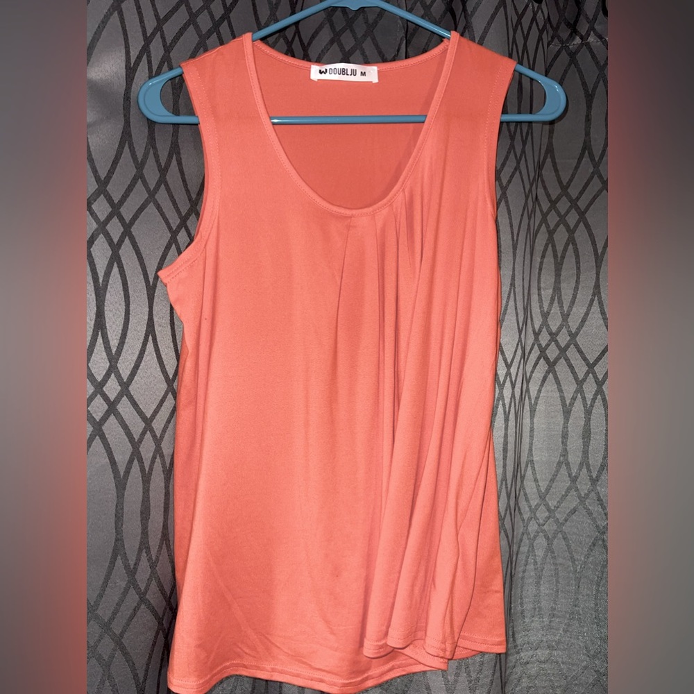 Medium Tank top. Loose fit.